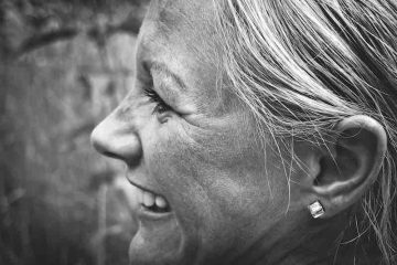 Woman smiling.